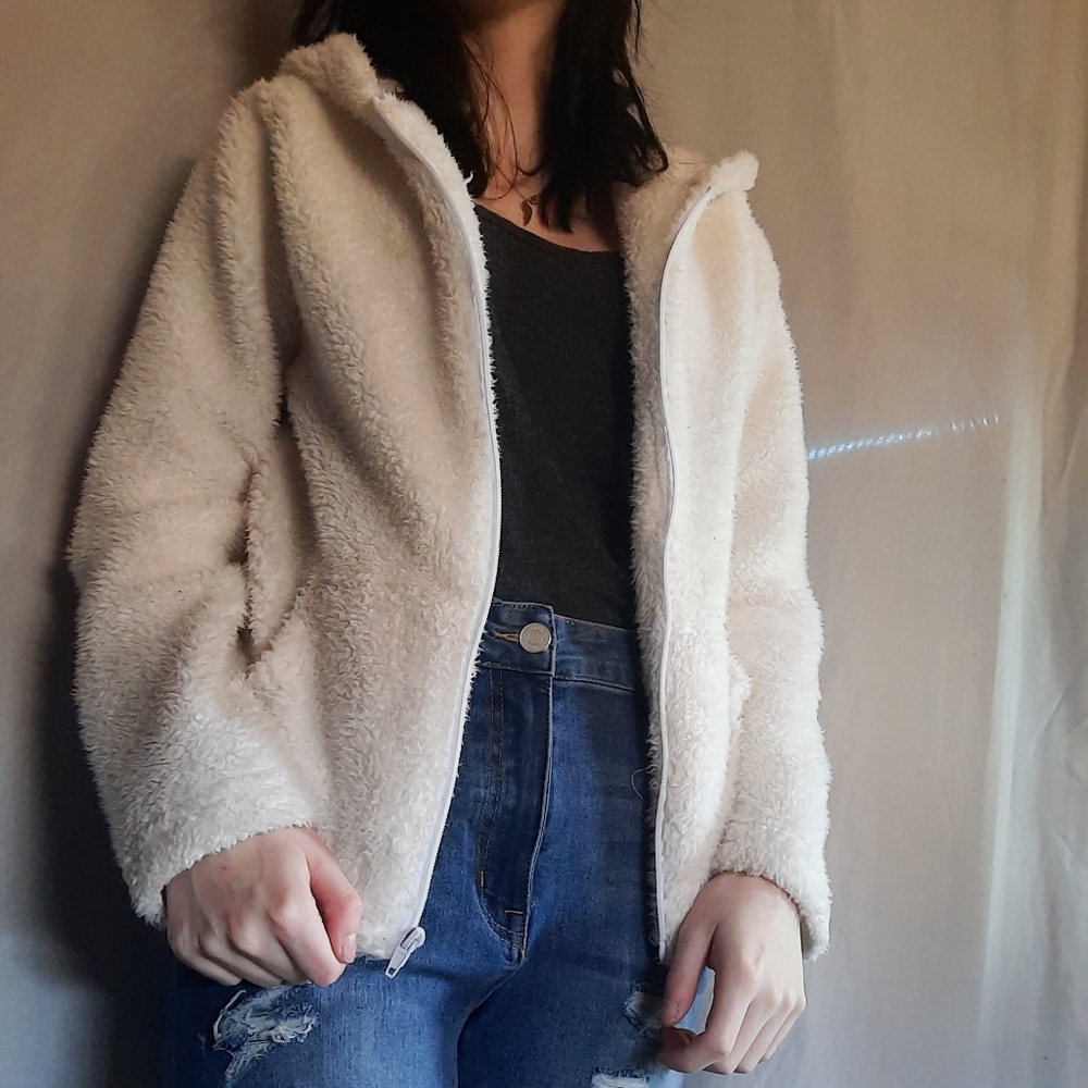 fluffy white zip up
